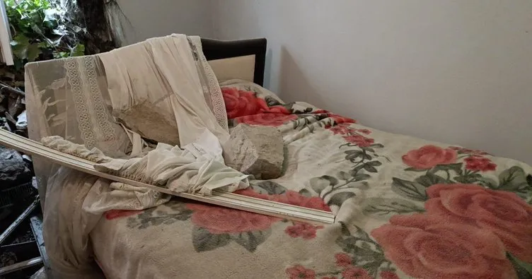 Amasya'da istinat duvarı evin üzerine çöktü